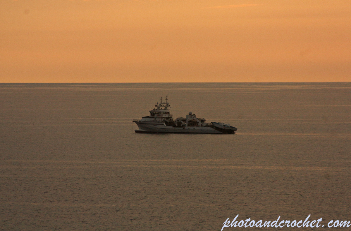 Fishing boat on anchor - Image